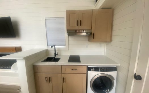 2025 8.5′ x 24′ NOAH certified home; downstairs bedroom and two lofts, lot at Lakeland Ridge Tiny Home Community